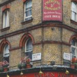 British Pub - Brown and Red Concrete Building