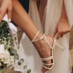 Pre-Raphaelites - Bride Holding a Bouquet and Fixing Her Shoe